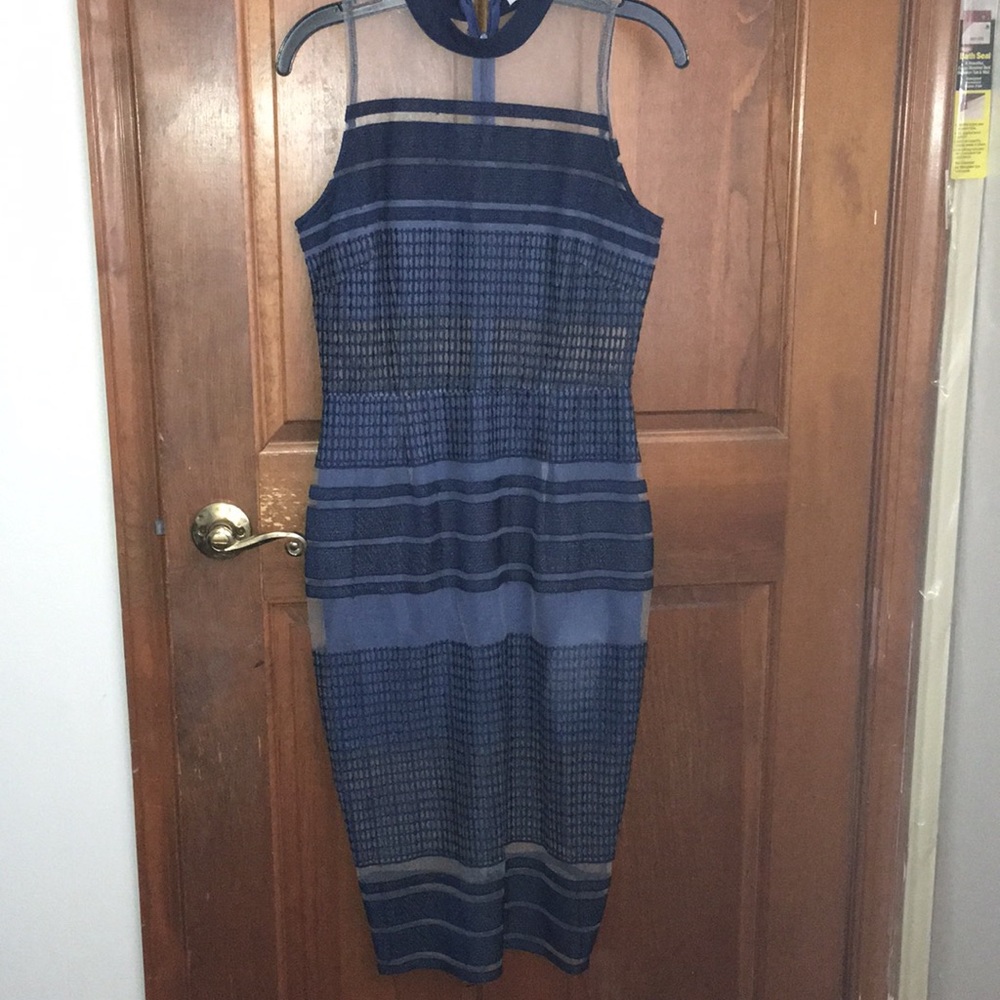 Navy blue dress with stripe cutouts